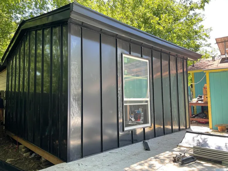 Black standing seam metal wall panels for Metal Roof Installation in West Monroe